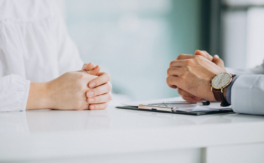 physician-consulting-his-patient-clinic-scaled.jpg physician-consulting-his-patient-clinic-scaled.jpg